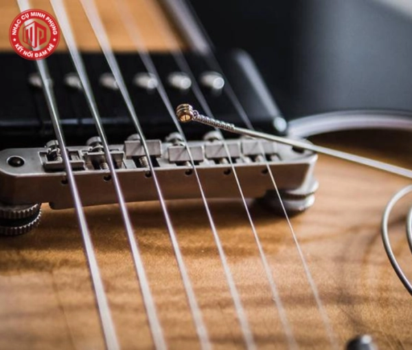 chọn dây đàn guitar không đau tay